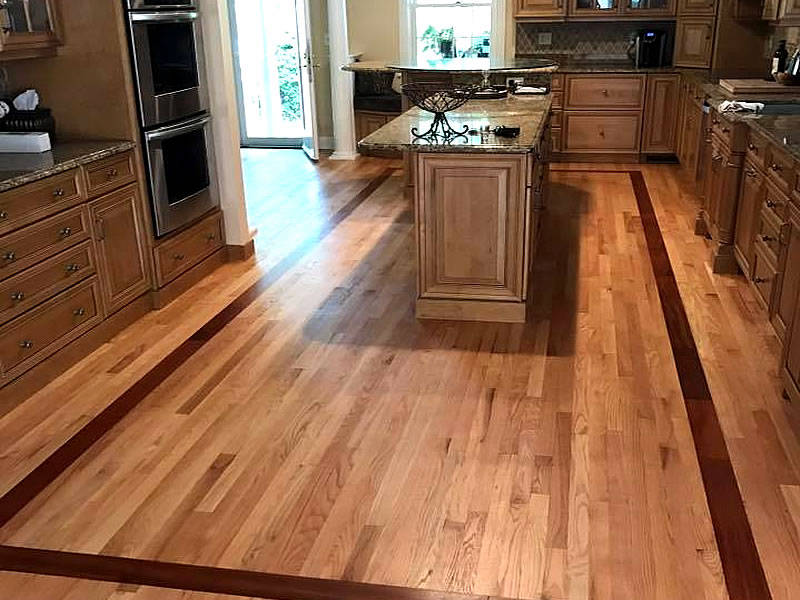 Landry Wood Flooring - Hardwood floor install with border outline